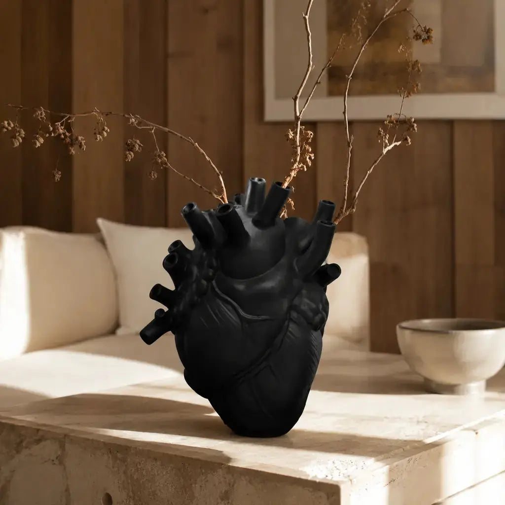Black Anatomical Heart Ceramic Art Vase in a premium modern interior