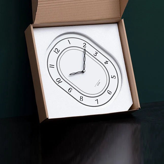 Black & White Silent Oval Wall Clock – Laser Engraved Roman Design - Lattea Global