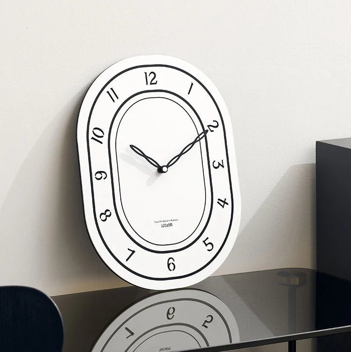 Black & White Silent Oval Wall Clock – Laser Engraved Roman Design - Lattea Global