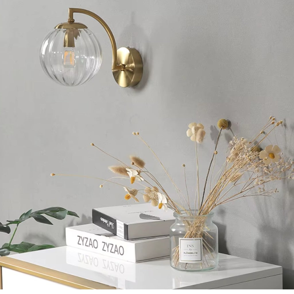 Gold Wall Sconce with Ribbed Glass Globe