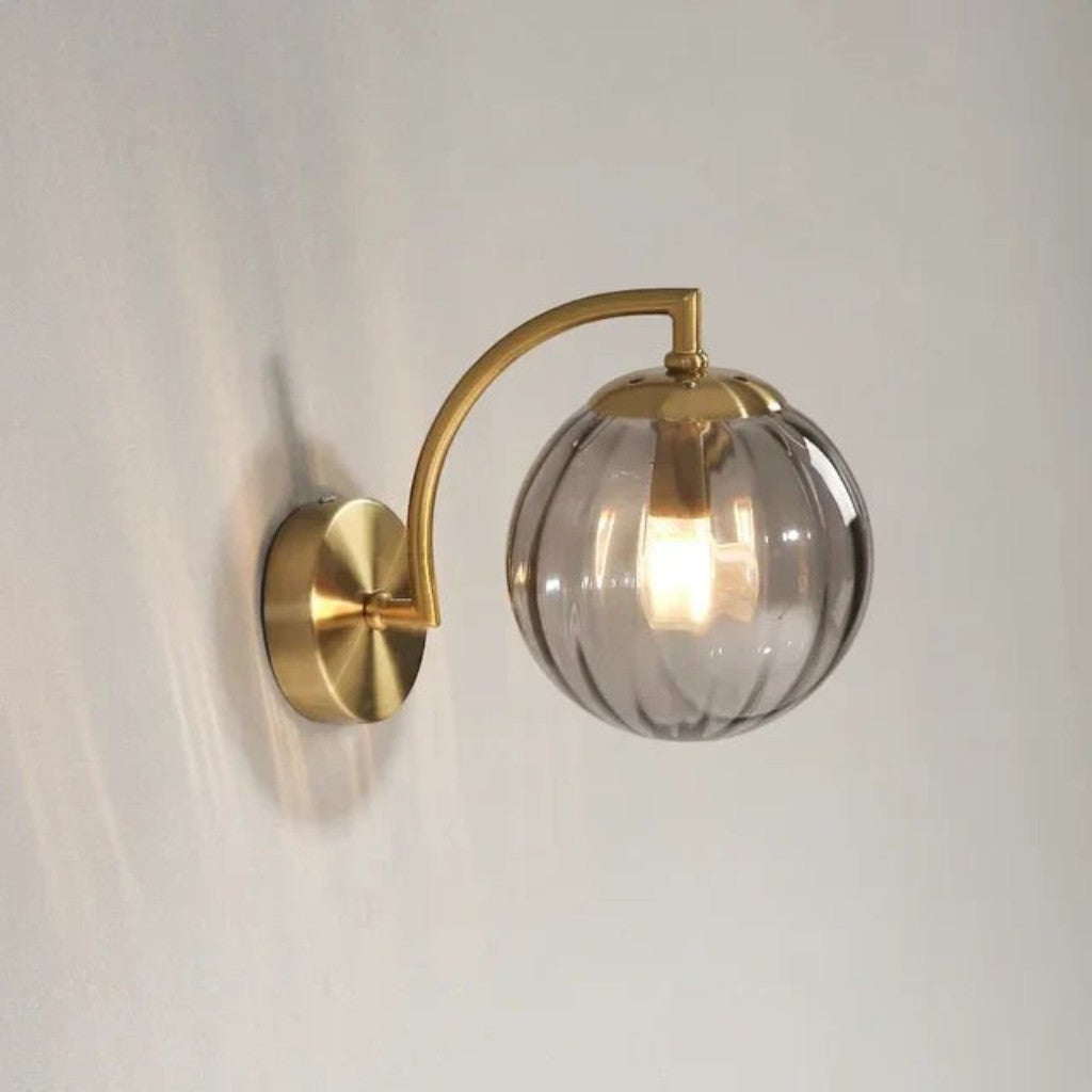 Gold Wall Sconce with Ribbed Glass Globe
