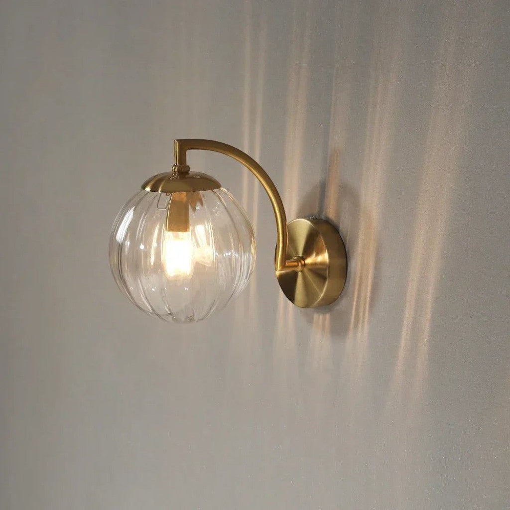 Gold Wall Sconce with Ribbed Glass Globe