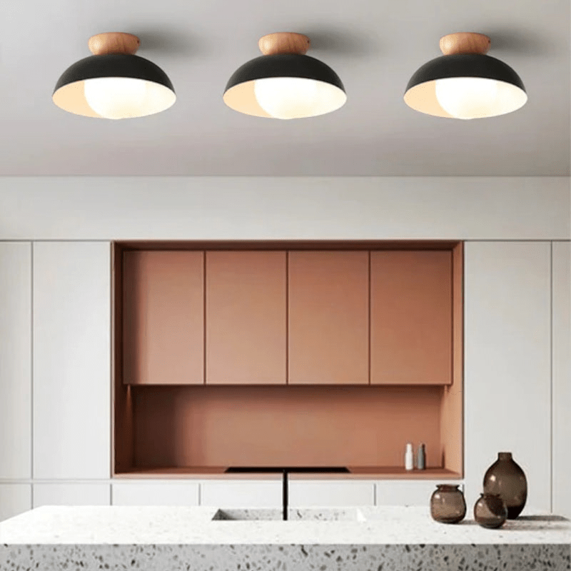 Lattea Global Nordic dome flush ceiling light with black metal shade, wood cap, and frosted glass diffuser.