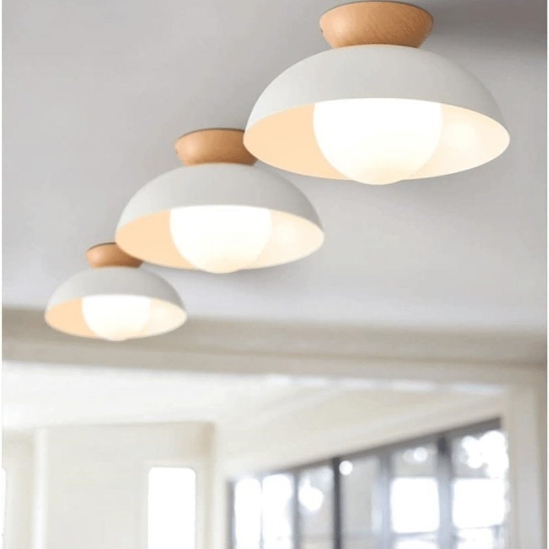 Lattea Global white metal dome flush ceiling light with frosted glass and natural wood cap.