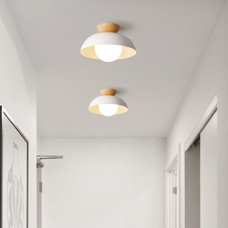 Lattea Global white dome flush ceiling light with wood accent and frosted glass diffuser.