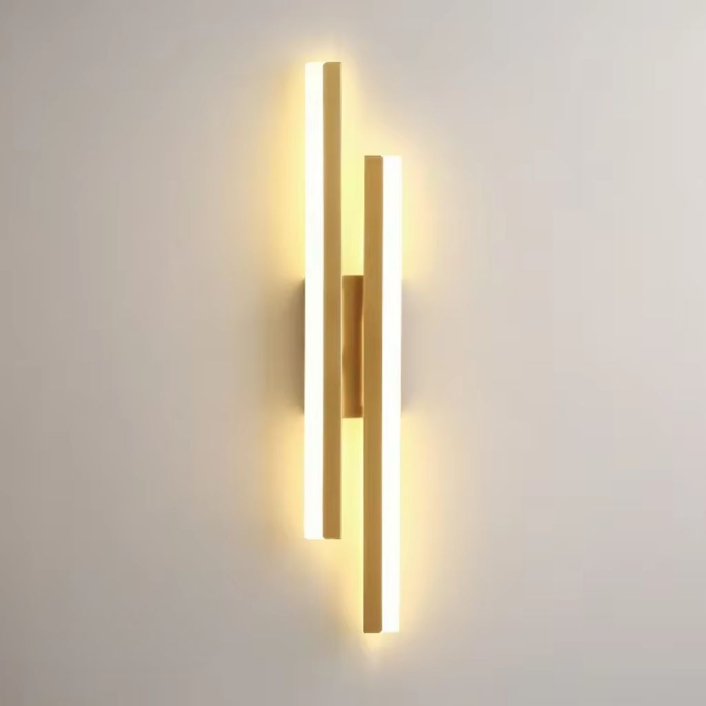 Modern wall-mounted light fixture on a plain wall