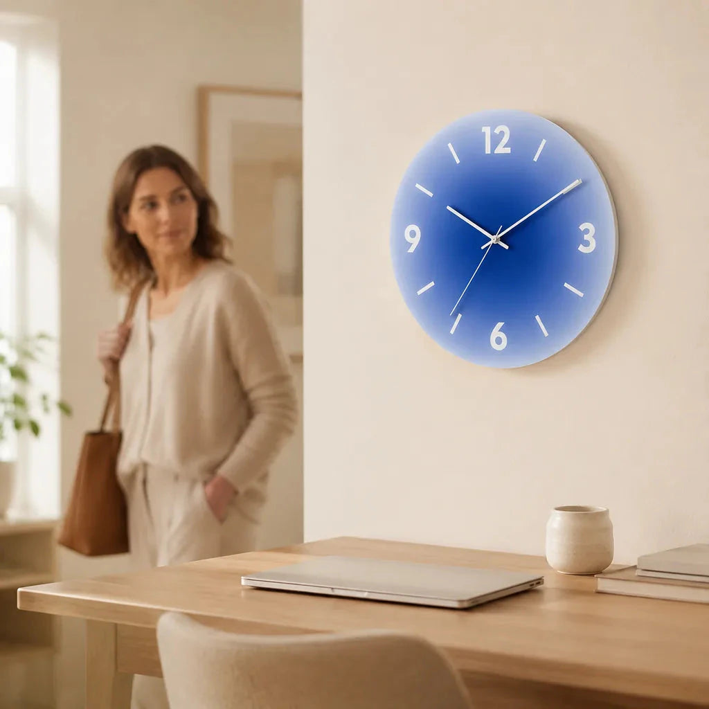 SkyGlow Sky-Inspired Glass Wall Clock in use in a home office