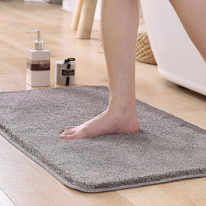 bathroom mat, non-slip mat, absorbent bath mat, plush bathroom rug, water-absorbing mat, machine washable mat, anti-slip bathroom rug, thick bathroom mat, polyester bath mat, daily use bathroom rug