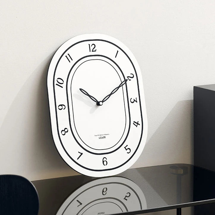 Black & White Silent Oval Wall Clock – Laser Engraved Roman Design