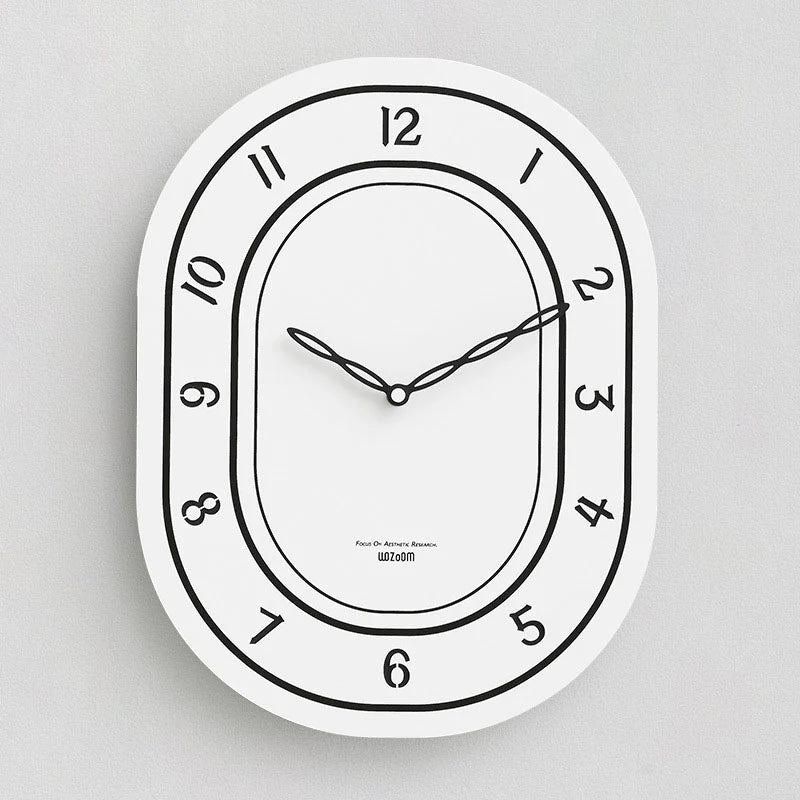 Black & White Silent Oval Wall Clock – Laser Engraved Roman Design