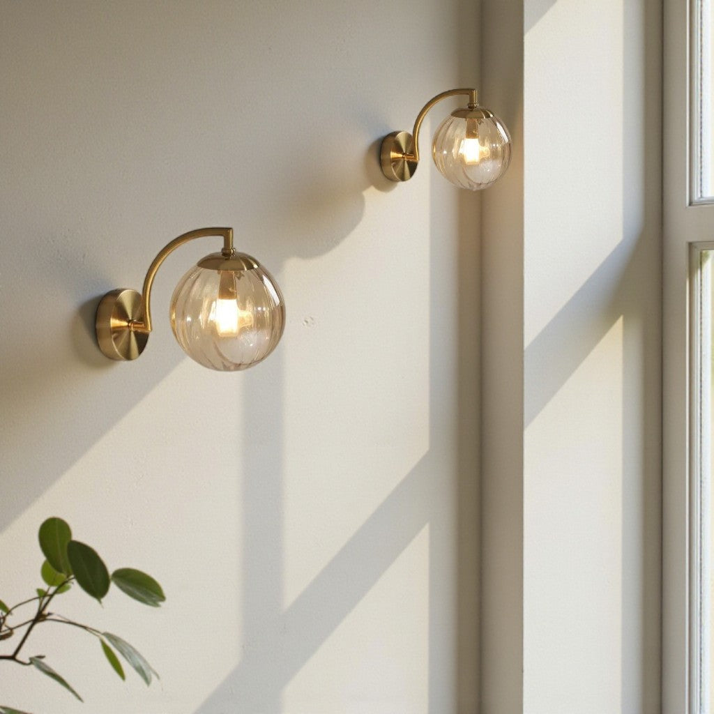 Gold Wall Sconce with Ribbed Glass Globe