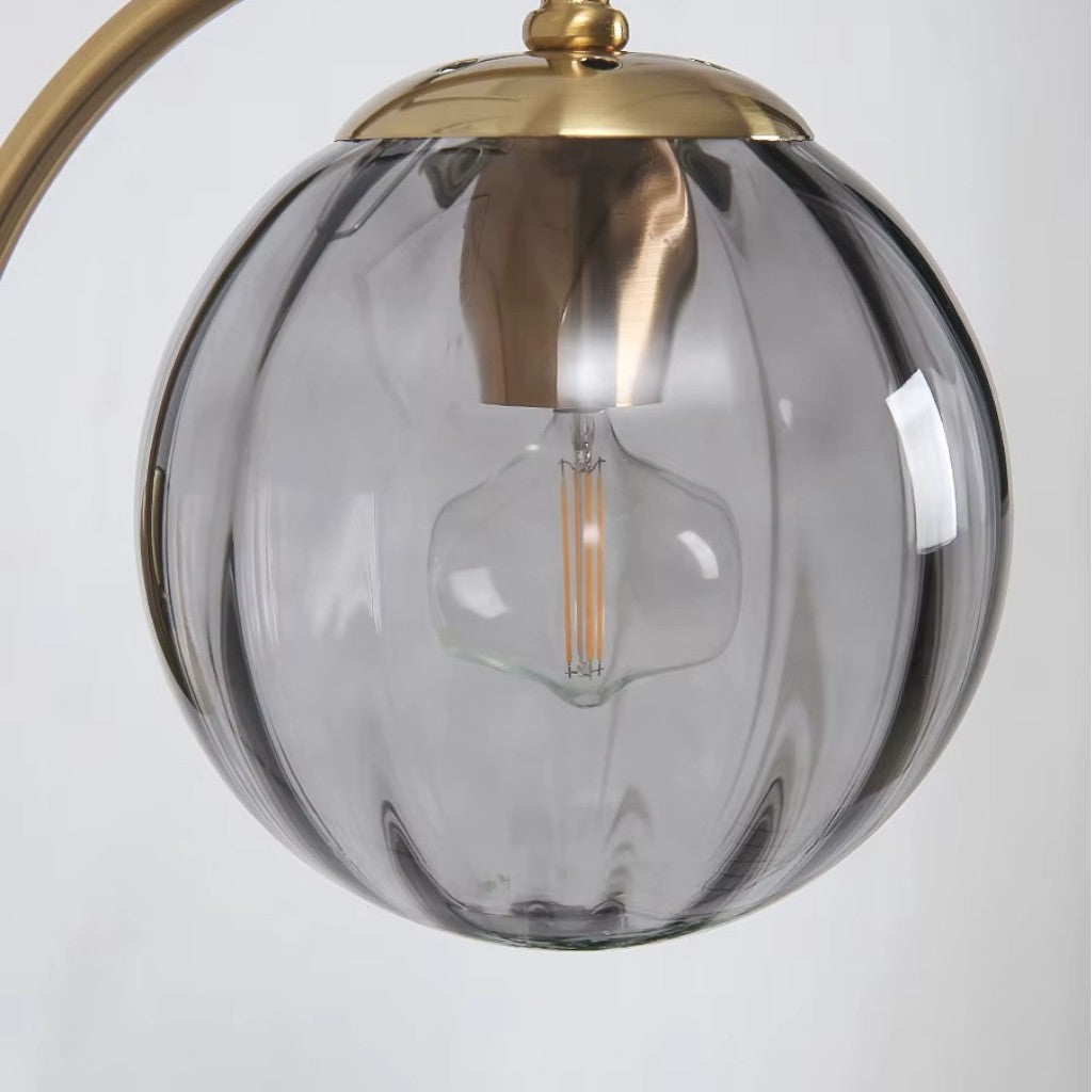 Gold Wall Sconce with Ribbed Glass Globe
