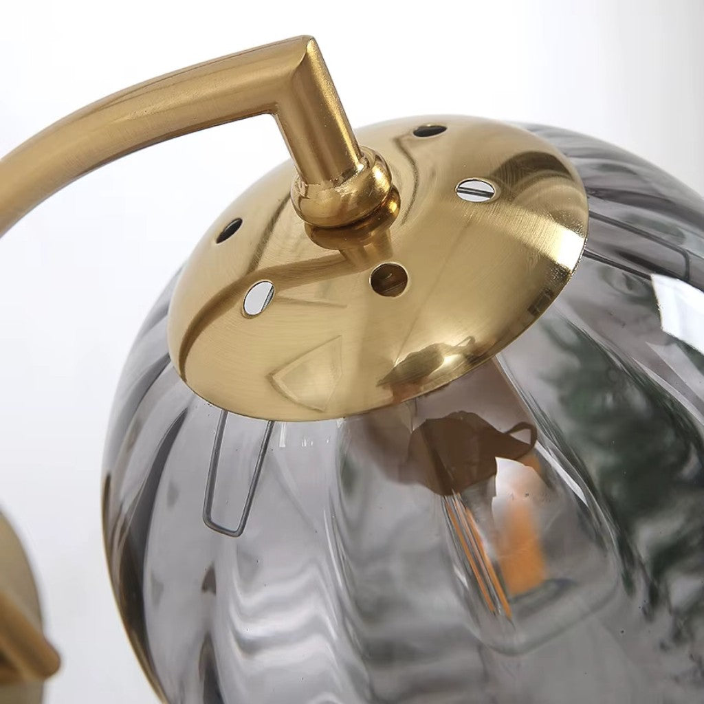 Gold Wall Sconce with Ribbed Glass Globe