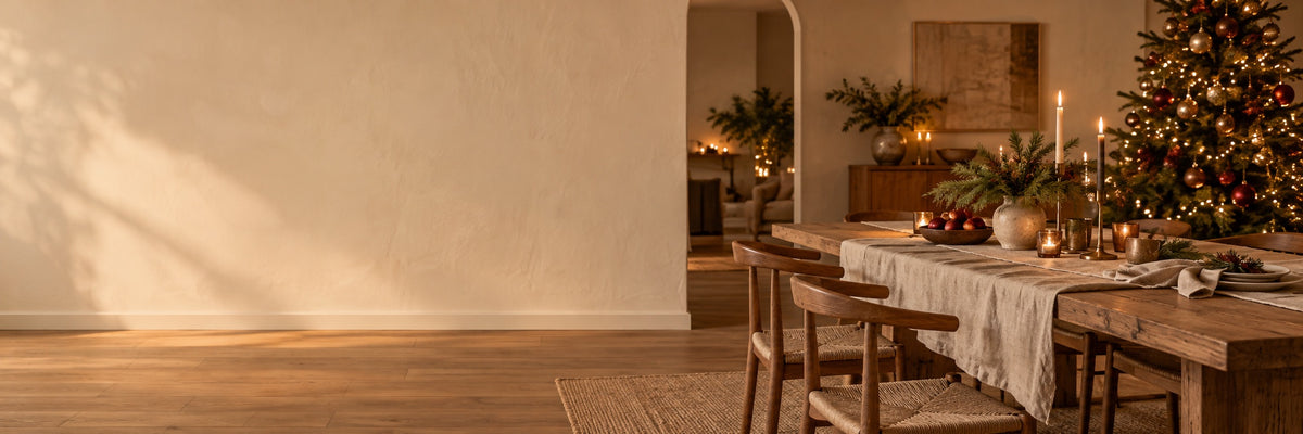 Warm Christmas interior with a festive tree and table setting