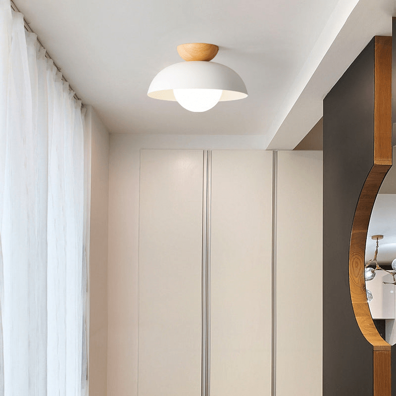 Lattea Global white metal dome flush ceiling light with natural wood cap and frosted glass diffuser.
