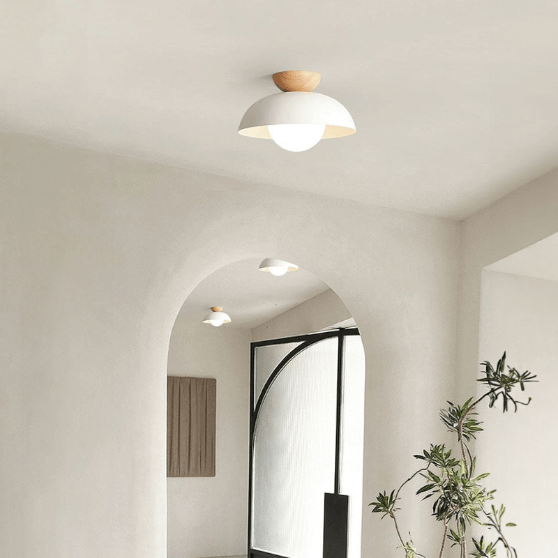 Lattea Global white dome flush ceiling light with wood cap and frosted glass diffuser.