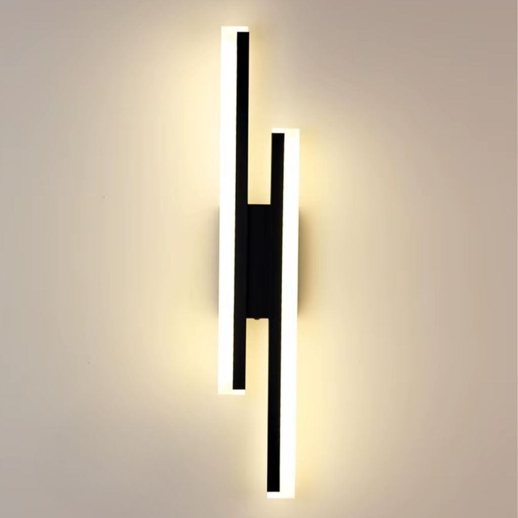 Modern wall lamp with two vertical lights on a neutral background