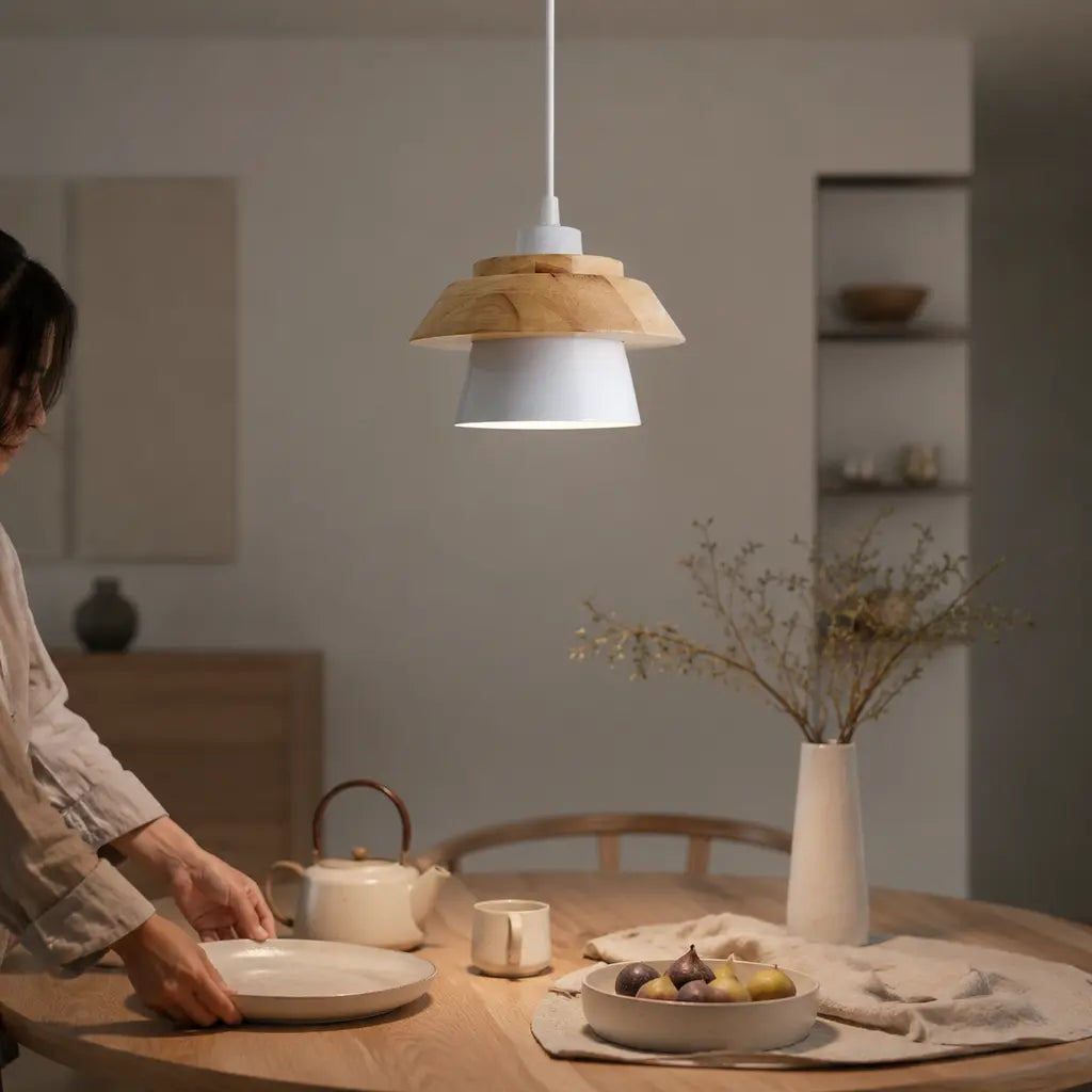 Nordic Iron & Wood Pendant Light in white above a dining table